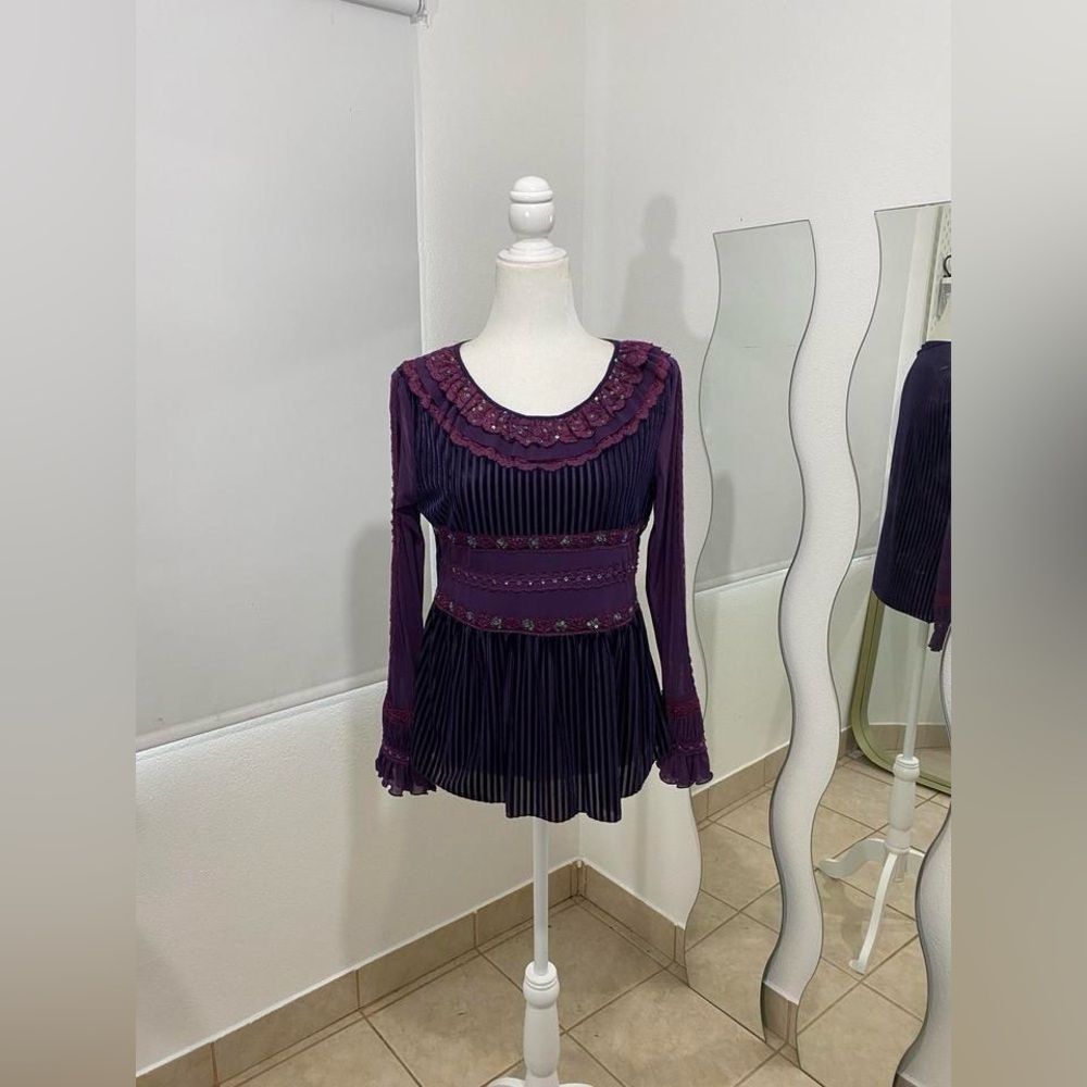 Purple long sleeve top with ruffles and beaded detailing